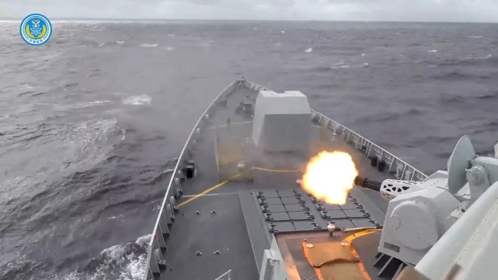 A ship fires a weapon during drills east of Taiwan, in this screenshot from a video released by the Eastern Theatre Command of China's People's Liberation Army (PLA) on December 29, 2025. Eastern Theatre Command/Handout via REUTERS ATTENTION EDITORS - THIS IMAGE WAS PROVIDED BY A THIRD PARTY. MANDATORY CREDIT. NO RESALES. NO ARCHIVES.   TPX IMAGES OF THE DAY