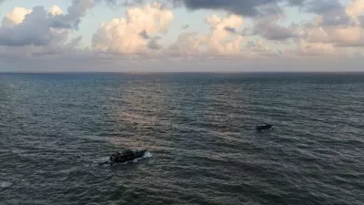 A boat that migrants say carries Venezuelan migrants sails offshore, a day after another boat carrying mostly Venezuelan migrants, some of whom said they were returning to Venezuela after being deported or failing to cross into the United States, sank near the coast of Colon, resulting in multiple casualties, in Miramar, Panama, December 28, 2025. REUTERS/Enea Lebrun