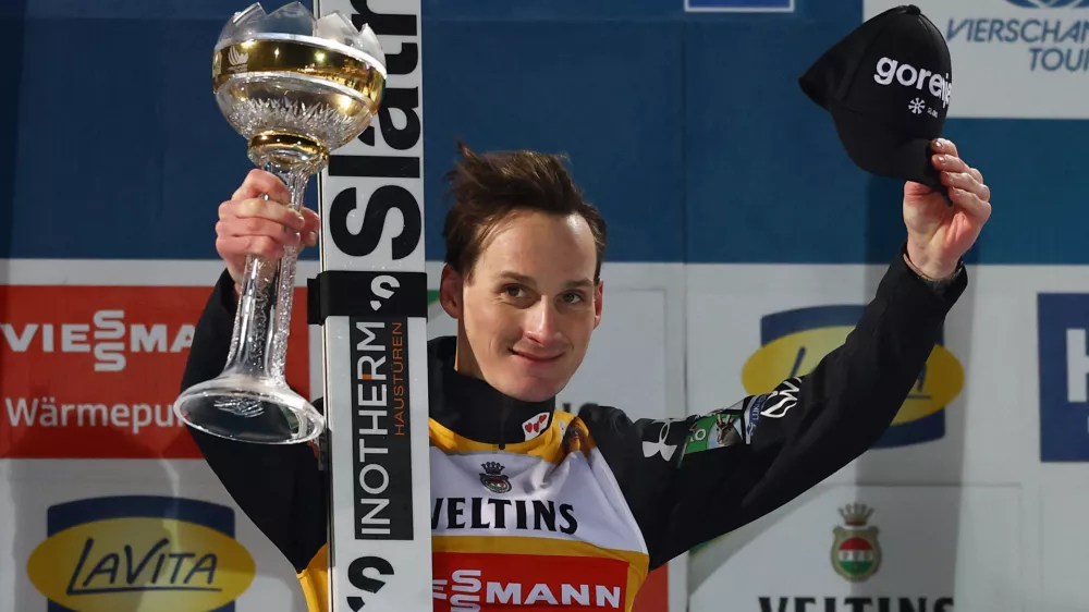 Ski Jumping - Four Hills Tournament - Oberstdorf, Germany - December 29, 2025 Slovenia's Domen Prevc celebrates on the podium after winning the Men's Individual HS137 REUTERS/Kai Pfaffenbach