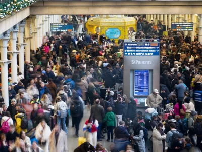 Travellers wait for Eurostar services at St Pancras International station in London, Tuesday, Dec. 30, 2025. (AP Photo/Alberto Pezzali)