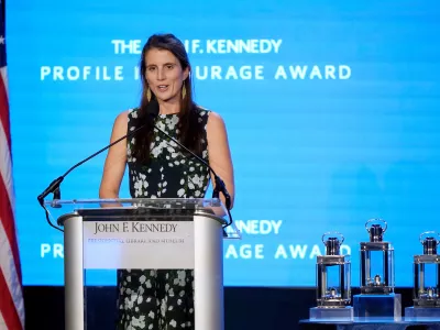 FILE - Tatiana Schlossberg, daughter of Caroline Kennedy, ambassador of the United States to Australia, addresses the audience during the John F. Kennedy Profile in Courage Award ceremony, Sunday, Oct. 29, 2023, at the John F. Kennedy Presidential Library and Museum, in Boston. (AP Photo/Steven Senne, File)