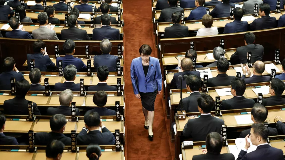 Sanae Takaichi, leader of the ruling Liberal Democratic Party, walks after casting a vote in an election to choose Japan's next prime minister at the Lower House of Parliament in Tokyo, Japan, October 21, 2025. Kyodo/via REUTERS ATTENTION EDITORS - THIS IMAGE WAS PROVIDED BY A THIRD PARTY. EDITORIAL USE ONLY. MANDATORY CREDIT. JAPAN OUT. NO COMMERCIAL OR EDITORIAL SALES IN JAPAN.