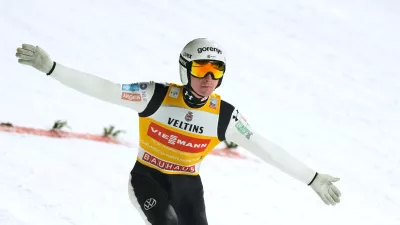 Domen Prevc, of Slovenia, lands his qualification jump at the second stage of the Four Hills ski jumping tournament in Garmisch-Partenkirchen, Germany, Wednesday, Dec. 31, 2025. (AP Photo/Matthias Schrader)
