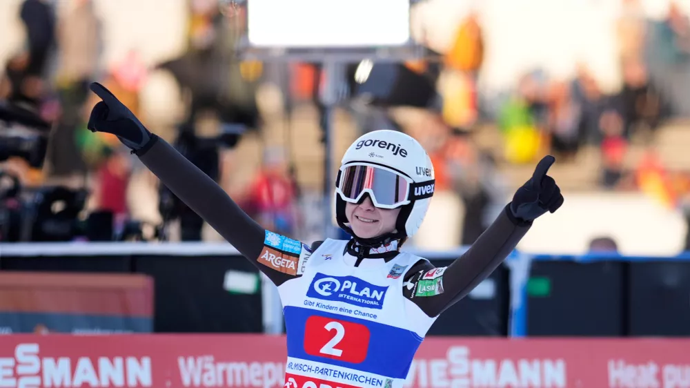 Nika Prevc, of Slovenia, reacts after her second round jump at the women's ski jumping World Cup competition in Garmisch-Partenkirchen, Germany, Wednesday, Dec. 31, 2025. (AP Photo/Matthias Schrader)