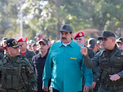 FILE PHOTO: Venezuela's President Nicolas Maduro speaks with Venezuela's Defense Minister Vladimir Padrino Lopez and Remigio Ceballos Strategic Operational Commander of the Bolivarian National Armed Forces, during a military exercise in Valencia, Venezuela January 27, 2019. Miraflores Palace/Handout via REUTERS ATTENTION EDITORS - THIS PICTURE WAS PROVIDED BY A THIRD PARTY./File Photo