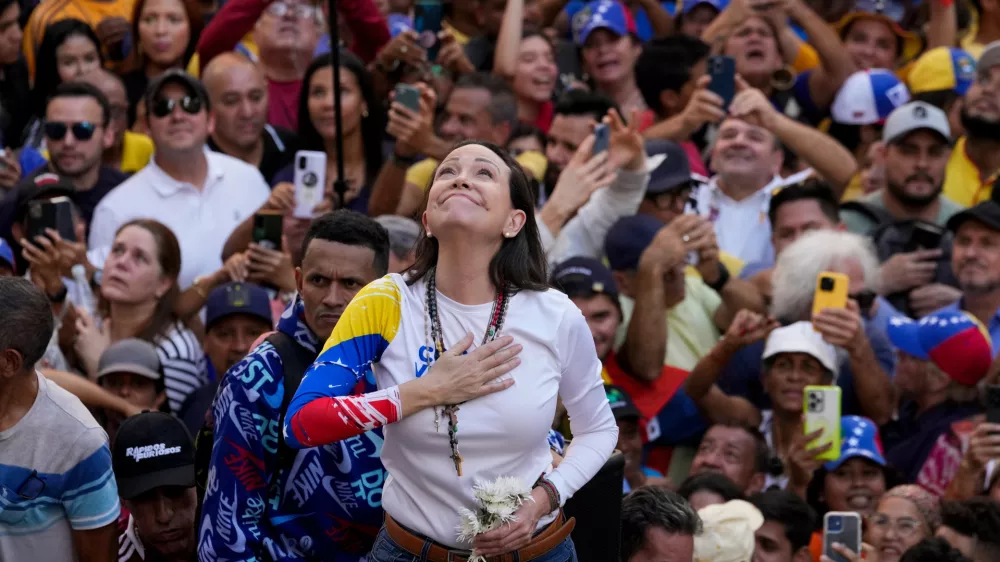 FILE - Venezuelan opposition leader Maria Corina Machado addresses supporters at a protest against President Nicolas Maduro in Caracas, Venezuela, Jan. 9, 2025, the day before his inauguration for a third term. (AP Photo/Ariana Cubillos, File)