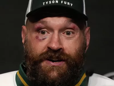 FILE - Britain's boxer Tyson Fury speaks at a press conference after loosing his fight against Ukraine's boxer Oleksandr Usyk for the WBA, WBO, and WBC heavyweight title in Riyadh, Saudi Arabia, Sunday, Dec. 22, 2024.(AP Photo/Frank Augstein, File)