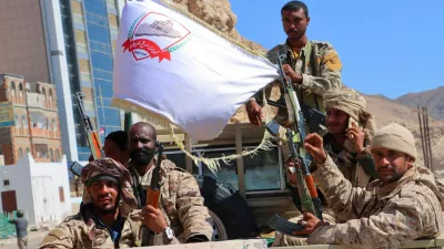 Government soldiers ride on the back of a pick-up truck in the Arabian Sea port city of Mukalla, as the Saudi-backed, internationally recognized government said it had retaken control of the key eastern port and capital of Hadramout province, from the southern separatists, Yemen January 4, 2026. REUTERS/Stringer   TPX IMAGES OF THE DAY