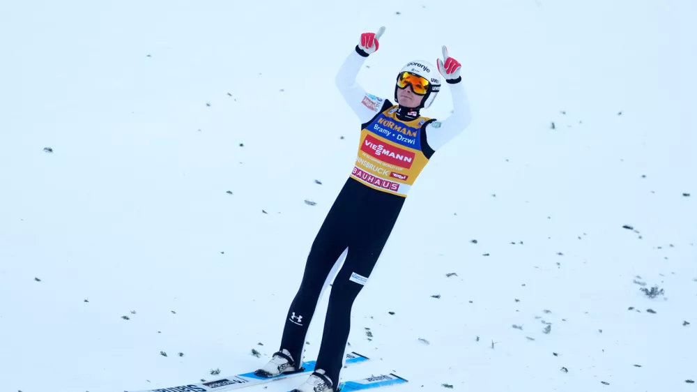 Domen Prevc, of Slovenia, reacts after his second round jump at the third stage of the Four Hills ski jumping tournament in Innsbruck, Austria, Sunday, Jan. 4, 2026. (AP Photo/Matthias Schrader)