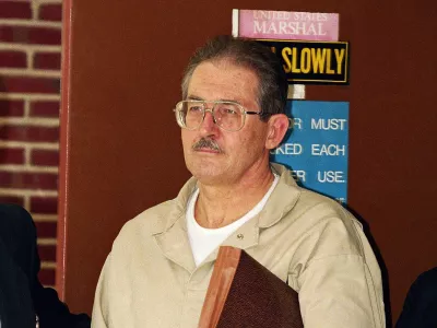 FILE - Former CIA agent Aldrich Ames leaves federal court after pleading guilty to espionage and tax evasion conspiracy charges April 28, 1994, in Alexandria, Va. (AP Photo/Wilfredo Lee, File)