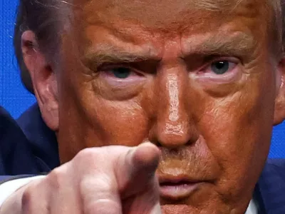 U.S. President Donald Trump gestures during a press conference at a NATO summit in The Hague, Netherlands June 25, 2025. REUTERS/Yves Herman   TPX IMAGES OF THE DAY