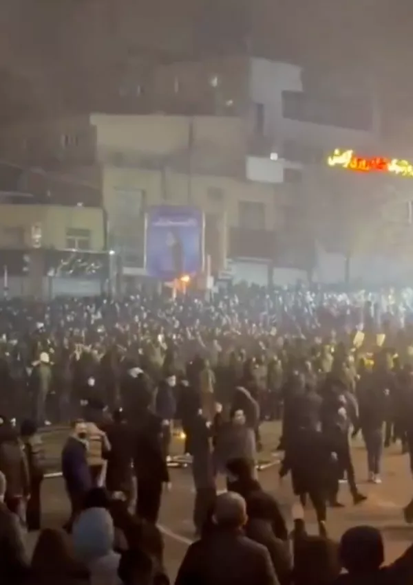 In this frame grab from video taken by an individual not employed by The Associated Press and obtained by the AP outside Iran shows people during a protest in Tehran, Iran, Friday, Jan. 9, 2026. (UGC via AP)
