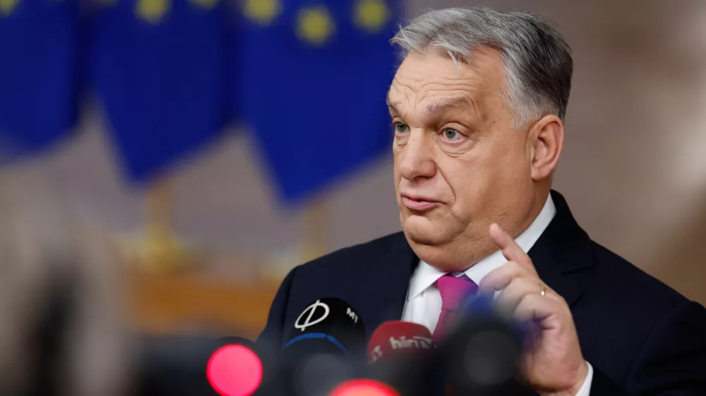Hungary's Prime Minister Viktor Orban speaks with the media as he arrives for the EU Summit in Brussels, Thursday, Dec. 18, 2025. (AP Photo/Geert Vanden Wijngaert)