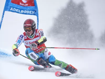 Slovenia's Zan Kranjec speeds down the course during an alpine ski, men's World Cup giant slalom, in Adelboden, Switzerland, Saturday, Jan. 10, 2026. (AP Photo/Giovanni Zenoni)