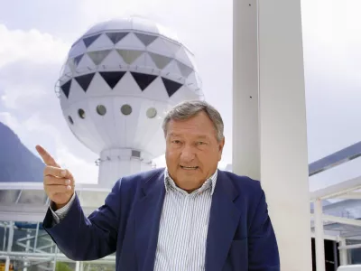 FILE - Erich von Daeniken, co-founder and co-owner of Mystery Park, poses in front of the Panorama Tower at Mystery Park in Interlaken, Wednesday, April 23, 2003. (Gaetan Ball)/Keystone via AP, File)