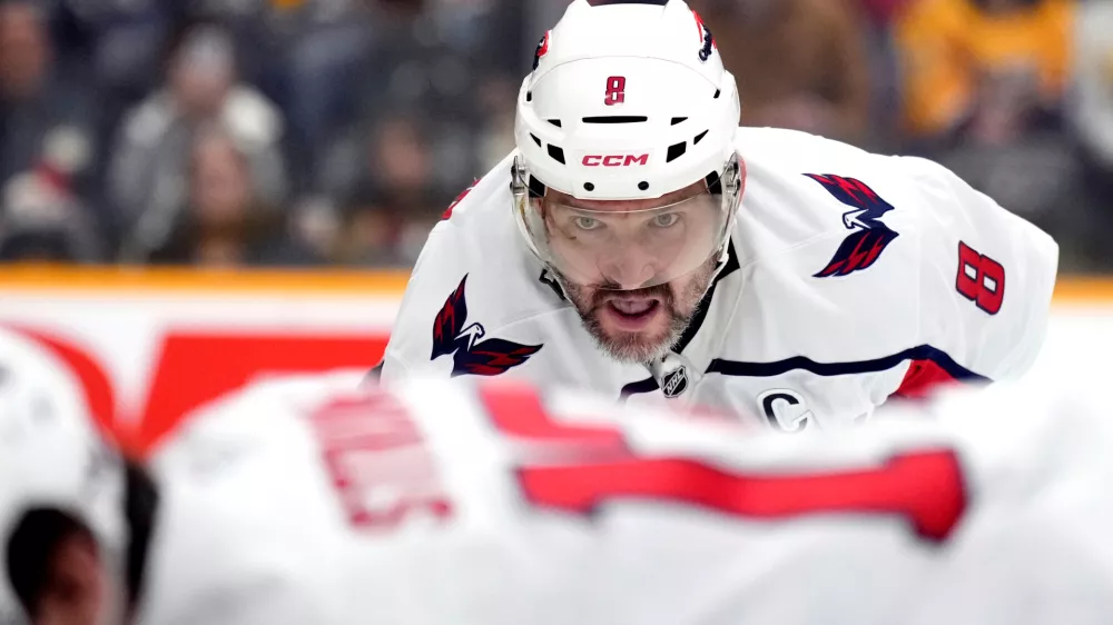 Washington Capitals left wing Alex Ovechkin (8) waits for the puck to be dropped during a face-off in the first period of an NHL hockey game against the Nashville Predators, Sunday, Jan. 11, 2026, in Nashville, Tenn. (AP Photo/Mark Humphrey)