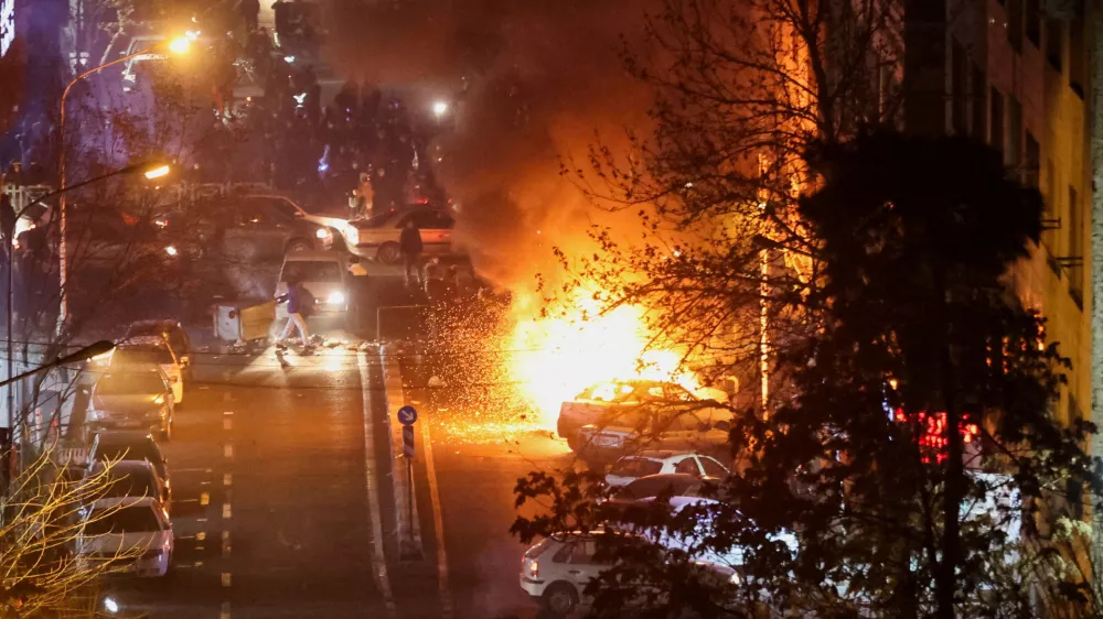 Cars burn in a street during a protest over the collapse of the currency's value, in Tehran, Iran, January 8, 2026. Stringer/WANA (West Asia News Agency) via REUTERS ATTENTION EDITORS - THIS PICTURE WAS PROVIDED BY A THIRD PARTY   TPX IMAGES OF THE DAY