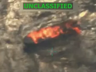 A vessel burns in this still image taken from a video released September 15, 2025, depicting what U.S. President Donald Trump said was a U.S. military strike on a Venezuelan drug cartel vessel that had been on its way to the United States, the second such strike carried out against a suspected drug boat in recent weeks. Donald Trump via Truth Social/via REUTERS THIS IMAGE HAS BEEN SUPPLIED BY A THIRD PARTY. NO RESALES. NO ARCHIVES. MANDATORY CREDIT. TPX IMAGES OF THE DAY Verification lines: Reuters checked the footage through our AI detection tool and found no evidence of manipulation. However, portions of the footage are partly blurred, making it impossible to confirm if the video is manipulated. Thorough verification is an ongoing process, and Reuters will continue to review the footage as more information becomes available.