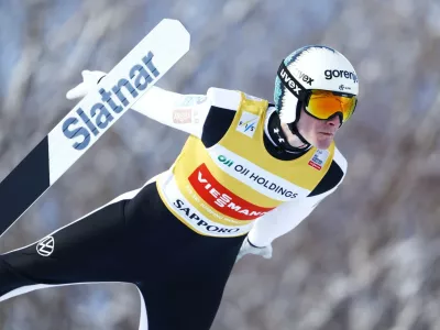 Domen Prevc of Slovenia competes at the Okurayama Hill during the World Cup Ski Jumping in Sapporo, northern Japan Sunday Jan. 18, 2026. (Natsumi Yasumoto/Kyodo Photo via AP) 