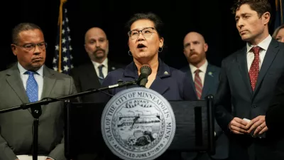Saint Paul Mayor Kaohly Her speaks at a press conference, while Minneapolis Mayor Jacob Frey and Minnesota Attorney General Keith Ellison listen, after an ICE agent fatally shot Renee Nicole Good, in Minneapolis, Minnesota, U.S., January 12, 2026.  REUTERS/Tim Evans