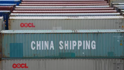 FILED - 09 July 2025, Hamburg: A container from China Shipping Container Lines (CSCL) stands among countless other containers at the Tollerort container terminal in the port of Hamburg. European Union firms are increasingly looking for new suppliers outside China to mitigate the effects of export restrictions imposed by Beijing, according to a survey released on Monday. Photo: Marcus Brandt/dpa
