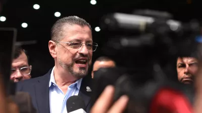 Costa Rican President Rodrigo Chaves speaks during a news conference regarding the seizure of four tons of drugs, at an air base in San Jose, Costa Rica, Friday, Nov. 28, 2025. (AP Photo/Jose Diaz)