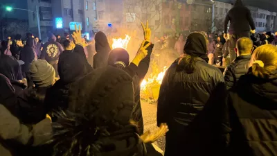 In this photo obtained by The Associated Press, Iranians attend an anti-government protest in Tehran, Iran, Friday, Jan. 9, 2026. (UGC via AP)