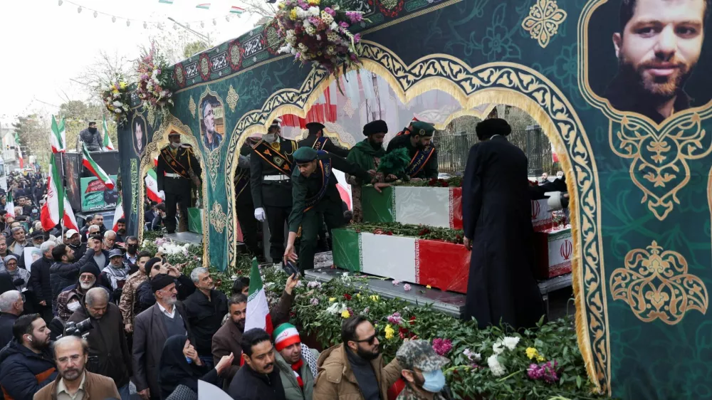 People attend the funeral of the security forces who were killed in the protests that erupted over the collapse of the currency's value in Tehran, Iran, January 14, 2026. Majid Asgaripour/WANA (West Asia News Agency) via REUTERS ATTENTION EDITORS - THIS PICTURE WAS PROVIDED BY A THIRD PARTY   TPX IMAGES OF THE DAY