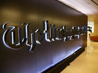 FILE PHOTO: The newspaper's banner logo is seen during the grand opening of the Washington Post newsroom in Washington January 28, 2016. REUTERS/Gary Cameron/File Photo