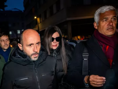 The owners of the "Le Constellation" bar in Crans-Montana, where the deadly fire happened on New Year's Day, Jacques und Jessica Moretti from France, center, arrive with their lawyers Patrick Michod, Yael Hayat and Nicola Meier, to be auditioned by the Valais public prosecutor's office in Sion, Switzerland, Friday, January 9, 2026. (Jean-Christophe Bott/Keystone via AP)