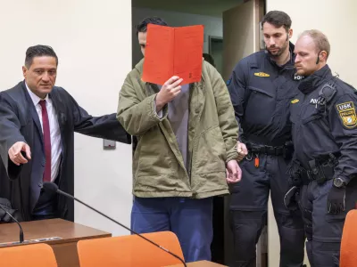 16 January 2026, Bavaria, Munich: The defendant Farhad N. arrives in the courtroom at the start of his trial on charges of double murder following a car attack on a demonstration in Munich on February 13, 2025. Photo: Peter Kneffel/dpa
