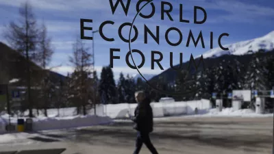 The the logo of the World Economic Forum displayed on a window at the Congress Center in Davos, Switzerland, Sunday, Jan. 14, 2024. The annual meeting of the World Economic Forum is taking place in Davos from Jan. 15 until Jan. 19, 2024. (AP Photo/Markus Schreiber)