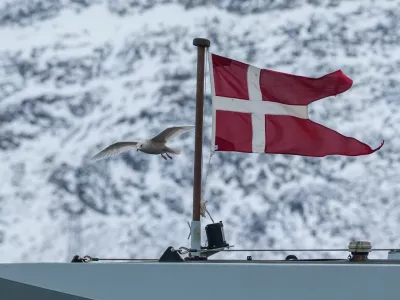 A seagull flies past the Danish military Offshore Patrol Vessel P570 HDMS Knud Rasmussen in Nuuk, Greenland, January 16, 2026. REUTERS/Marko Djurica