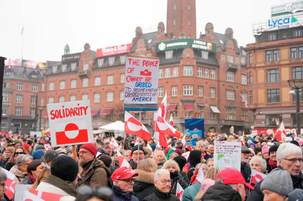 People take part in the "Hands Off Greenland" protest, held under the slogans "Hands Off Greenland" and "Greenland for Greenlanders", after the White House said that the U.S. was considering a range of options to acquire Greenland, including the use of military force, in Copenhagen, Denmark, January 17, 2026. Ritzau Scanpix/Emil Helms/via REUTERS  ATTENTION EDITORS - THIS IMAGE WAS PROVIDED BY A THIRD PARTY. DENMARK OUT. NO COMMERCIAL OR EDITORIAL SALES IN DENMARK.
