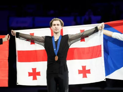 Georgia's Nika Egadze celebrates after winning the gold medal in the Men's Free Skating on day four of the ISU European Figure Skating Championships in Sheffield, Thursday, Friday, Jan. 16, 2026. (Danny Lawson/PA via AP)