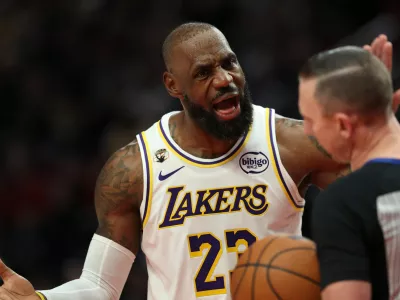 Los Angeles Lakers forward LeBron James (23) argues with referee Justin Van Duyne (64) after being given a flagrant foul during the second half of an NBA basketball game against the Portland Trail Blazers Saturday, Jan. 17, 2026, in Portland, Ore. (AP Photo/Amanda Loman)