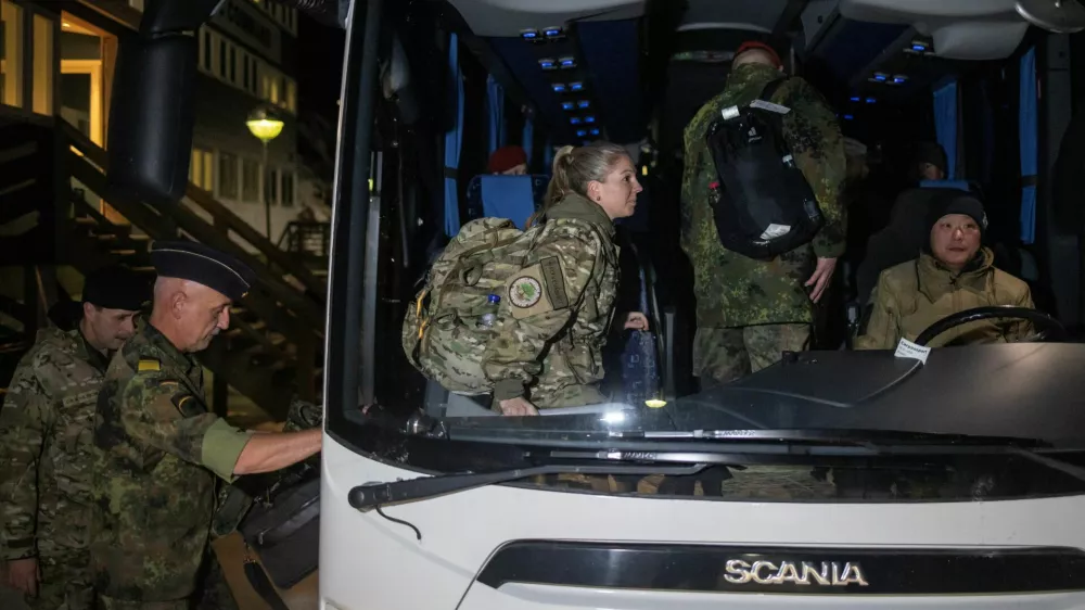 Soldiers from the German Armed Forces board a bus upon their arrival in Nuuk, Greenland, January 16, 2026. REUTERS/Marko Djurica