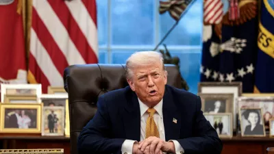 FILE PHOTO: U.S. President Donald Trump is interviewed by Reuters White House correspondent Steve Holland (not pictured) during an exclusive interview in the Oval Office in the White House in Washington, D.C., U.S., January 14, 2026. REUTERS/Evelyn Hockstein/File Photo