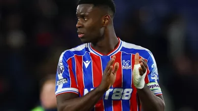 FILE PHOTO: Soccer Football - Premier League - Crystal Palace v Fulham - Selhurst Park, London, Britain - January 1, 2026 Crystal Palace's Marc Guehi applauds fans after the match Action Images via Reuters/Matthew Childs EDITORIAL USE ONLY. NO USE WITH UNAUTHORIZED AUDIO, VIDEO, DATA, FIXTURE LISTS, CLUB/LEAGUE LOGOS OR 'LIVE' SERVICES. ONLINE IN-MATCH USE LIMITED TO 120 IMAGES, NO VIDEO EMULATION. NO USE IN BETTING, GAMES OR SINGLE CLUB/LEAGUE/PLAYER PUBLICATIONS. PLEASE CONTACT YOUR ACCOUNT REPRESENTATIVE FOR FURTHER DETAILS../File Photo