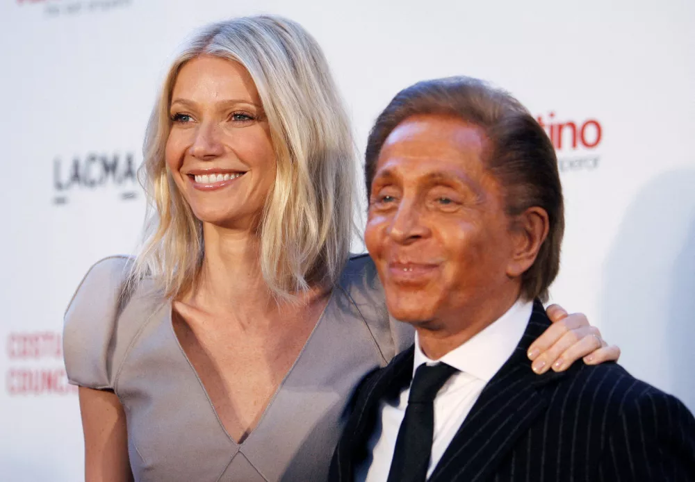 FILE PHOTO: Actress Gwyneth Paltrow and Italian fashion designer Valentino Garavani pose at the West Coast premiere of the documentary "Valentino: The Last Emperor" at the Los Angeles County Museum of Art (LACMA) in Los Angeles April 1, 2009. REUTERS/Mario Anzuoni/File Photo