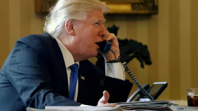 U.S. President Donald Trump speaks by phone with Russia's President Vladimir Putin in the Oval Office at the White House in Washington, U.S. January 28, 2017. REUTERS/Jonathan Ernst