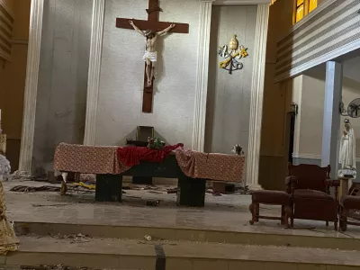 A view of the St. Francis Catholic Church in Owo Nigeria, Sunday, June 5, 2022. Lawmakers in southwestern Nigeria say more than 50 people are feared dead after gunmen opened fire and detonated explosives at a church. Ogunmolasuyi Oluwole with the Ondo State House of Assembly said the gunmen targeted the St Francis Catholic Church in Ondo state on Sunday morning just as the worshippers gathered for the weekly Mass. (AP Photo/Rahaman A Yusuf)