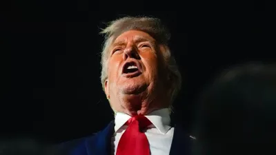 President Donald Trump speaks with reporters after arriving at Palm Beach International Airport, Monday, Jan. 19, 2026, in West Palm Beach, Fla. (AP Photo/Julia Demaree Nikhinson)