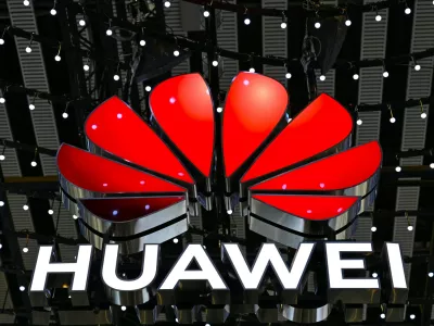 FILED - 04 March 2025, Spain, Barcelona: The logo of Chinese technology group Huawei hangs from the ceiling of a hall at the Mobile World Congress (MWC) mobile communications trade fair. Photo: Wolf von Dewitz/dpa
