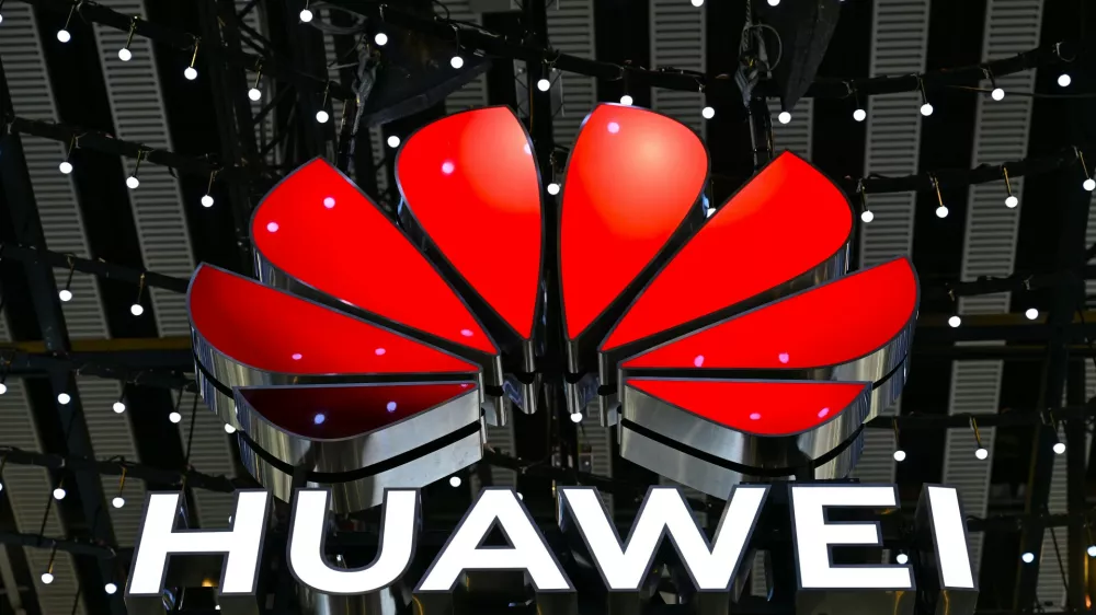 FILED - 04 March 2025, Spain, Barcelona: The logo of Chinese technology group Huawei hangs from the ceiling of a hall at the Mobile World Congress (MWC) mobile communications trade fair. Photo: Wolf von Dewitz/dpa