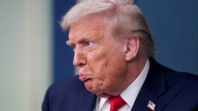 U.S. President Donald Trump reacts during a press briefing at the White House, on the one-year mark into his second term in office, in Washington, D.C., U.S., January 20, 2026. REUTERS/Nathan Howard