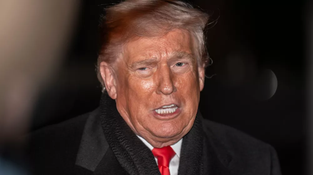 20 January 2026, US, Washington: US President DONALD TRUMP speaks to the press before departing the white house on Marine One. Photo: Joey Sussman/ZUMA Press Wire/dpa