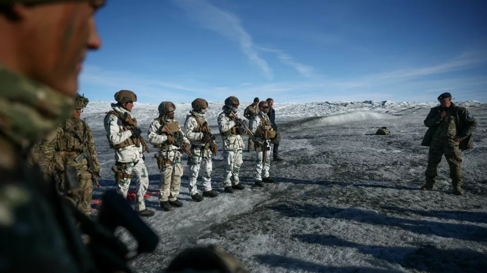 FILE PHOTO: Chief of Joint Arctic Command, Major General Soren Andersen speaks to members of the Danish and French armed forces during a military drill as Danish, Swedish, and Norwegian home guard units together with Danish, German and French troops take part in joint military drills in Kangerlussuaq, Greenland, September 17, 2025. REUTERS/Guglielmo Mangiapane/File Photo