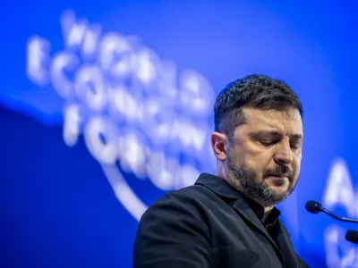 Ukraine's President Volodymyr Zelenskyy pauses as he delivers a speech at the Annual Meeting of the World Economic Forum in Davos, Switzerland, Thursday, Jan. 22, 2026. (Gian Ehrenzeller/Keystone via AP)