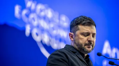 Ukraine's President Volodymyr Zelenskyy pauses as he delivers a speech at the Annual Meeting of the World Economic Forum in Davos, Switzerland, Thursday, Jan. 22, 2026. (Gian Ehrenzeller/Keystone via AP)